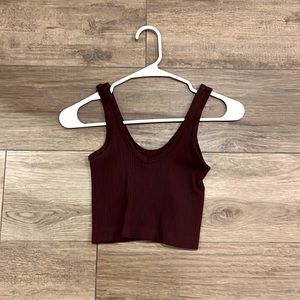 Woman’s burgundy crop top